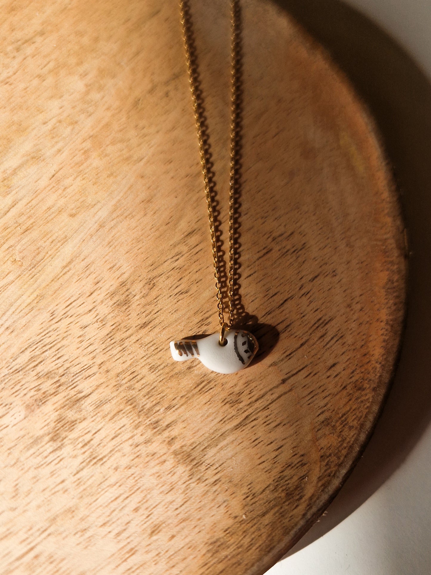 Collier Oiseau en porcelaine