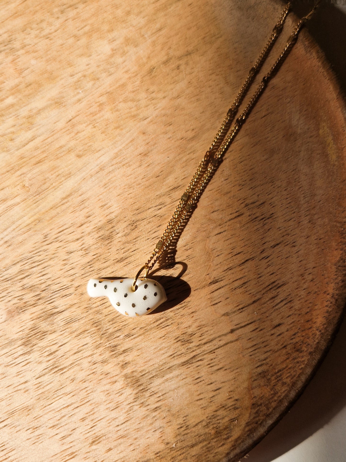 Collier Oiseau en porcelaine