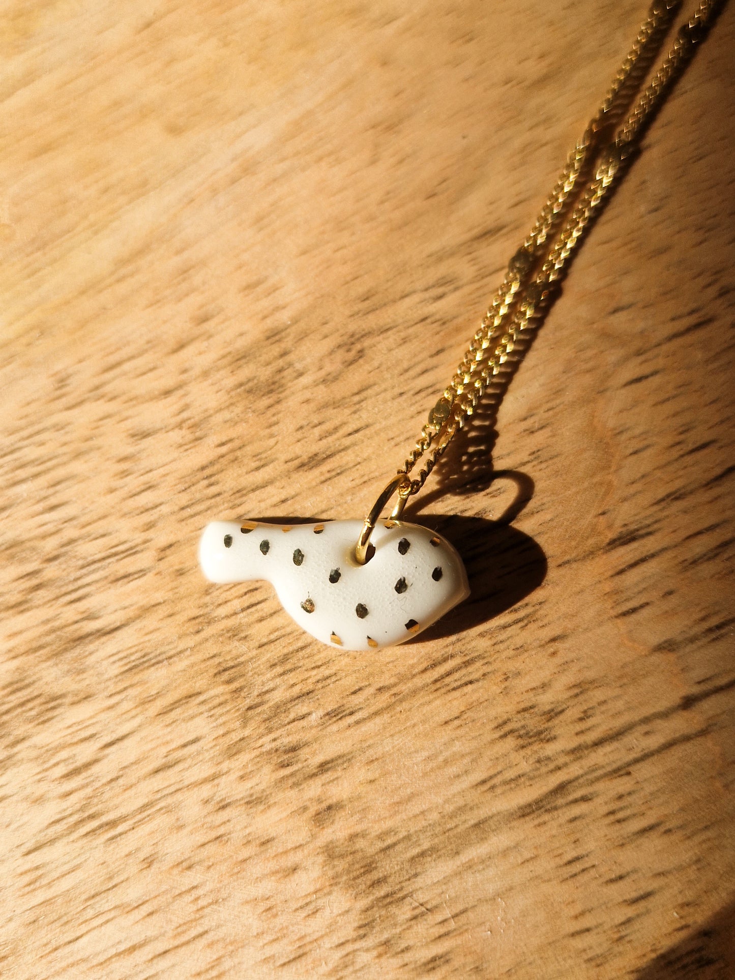 Collier Oiseau en porcelaine