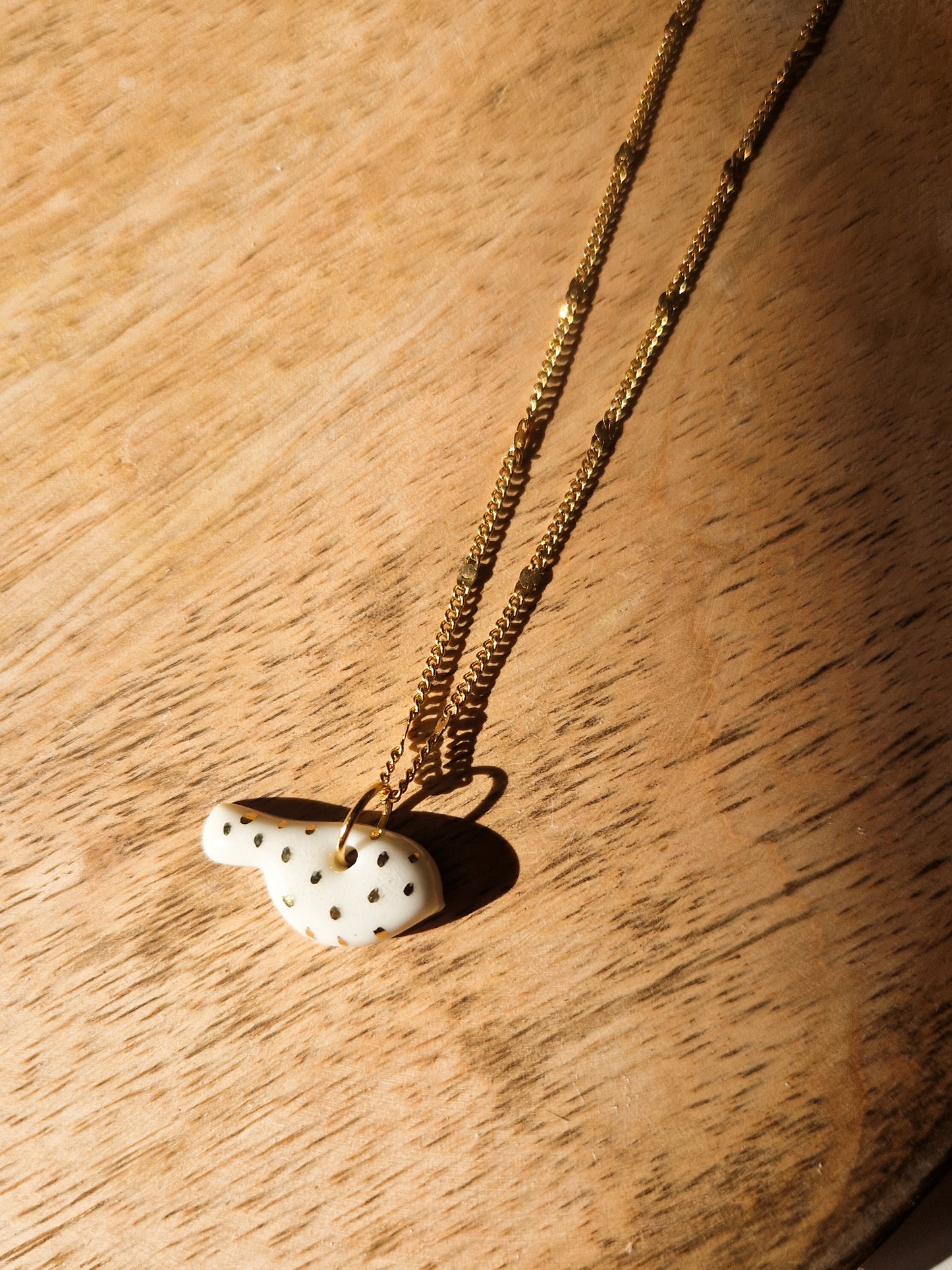 Collier Oiseau en porcelaine