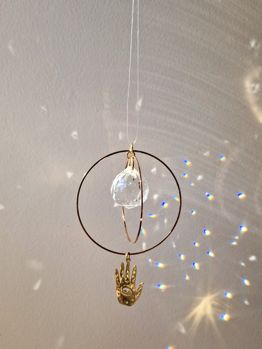 Attrape-Soleil Main protectrice