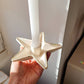 Bougeoir pour bougie chandelle en forme d'étoile blanche avec feuilles d'or
